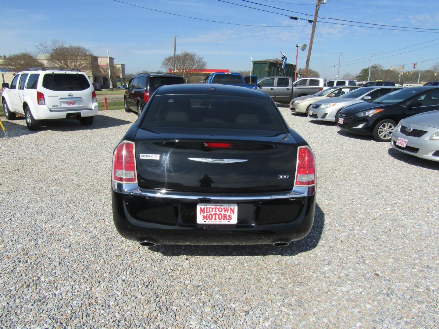 2013 Black /Tan Chrysler 300 RWD (2C3CCAAG5DH) with an 3.6L V6 SOHC 24V engine, Automatic transmission, located at 15016 S Hwy 231, Midland City, AL, 36350, (334) 983-3001, 31.306210, -85.495277 - Photo#6